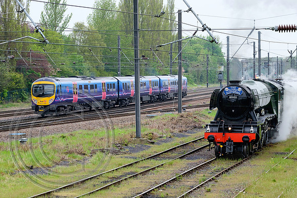 185148 1P33 passes 60103 York Holgate Sidings 10052016