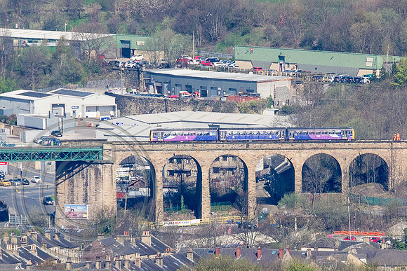 A Northern 144 crosses Paddock Viaduct with 2B39 from Huddersfield to Sheffield on 20th April 2016.
